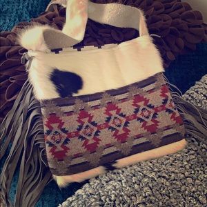 Cowhide and leather purse
